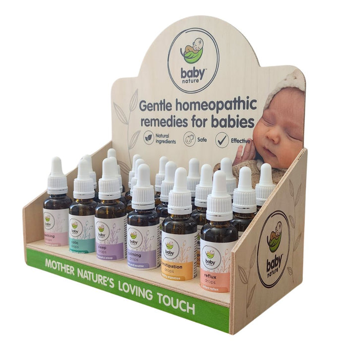 Retail display of BabyNature homeopathic drops - natural remedies for baby comfort.