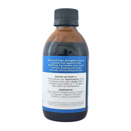 Wholesale Black Seed + Oregano Oil bottle showing the ingredients label with directions for use and supplement facts.