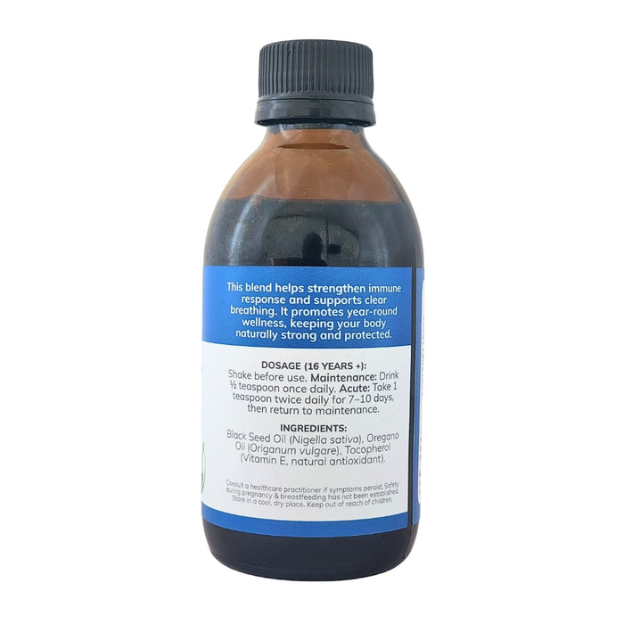 Wholesale Black Seed + Oregano Oil bottle showing the ingredients label with directions for use and supplement facts.