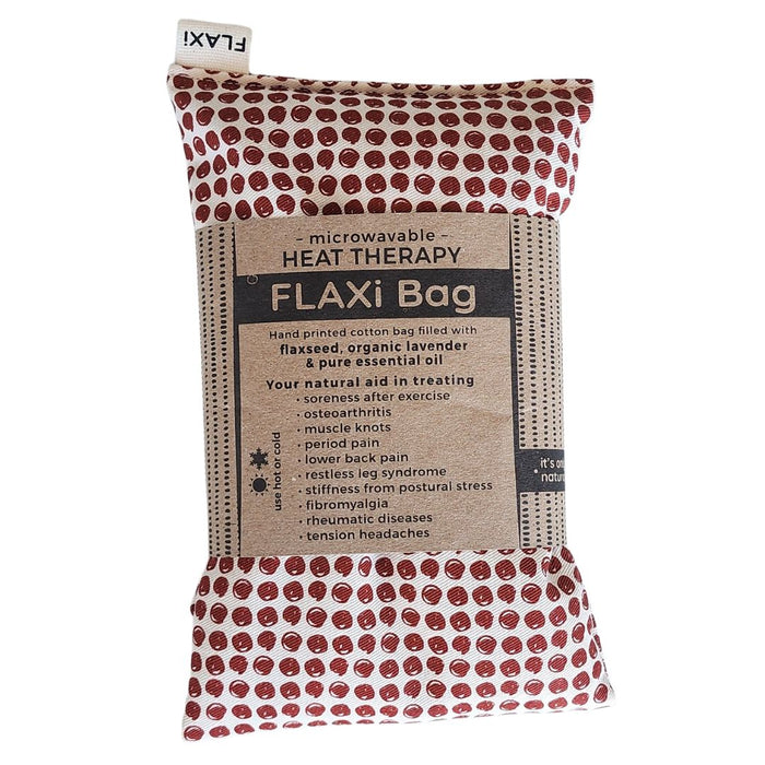 Microwavable FLAXi heat therapy bag with maroon dot pattern and product label