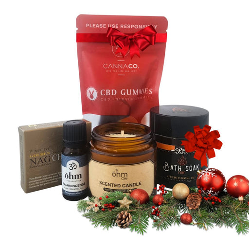 Collection of wholesale festive gifts for retail stores - includes CBD Gummies, Incense Cones, Scented Soy Candles, Frankincense Oils and Bath Soaks.