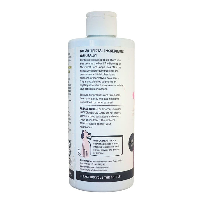 Wholesale Devoted by Nature pet care bottle showing the back label with “No Artificial Ingredients Naturally!” messaging and product care information.