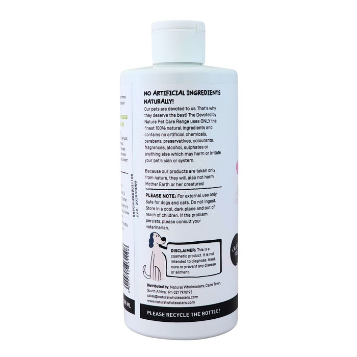 Wholesale Devoted by Nature Anti-Itch Spray bottle showing the back label with “No Artificial Ingredients Naturally!” messaging and product care information.