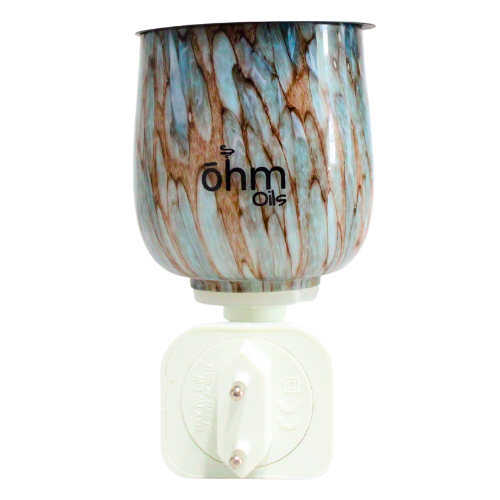 Wholesale distribution Ohm Electric Wax Burner in Marbled Glass  - perfect for aromatherapy in any space, during yoga or meditation, with no flame.